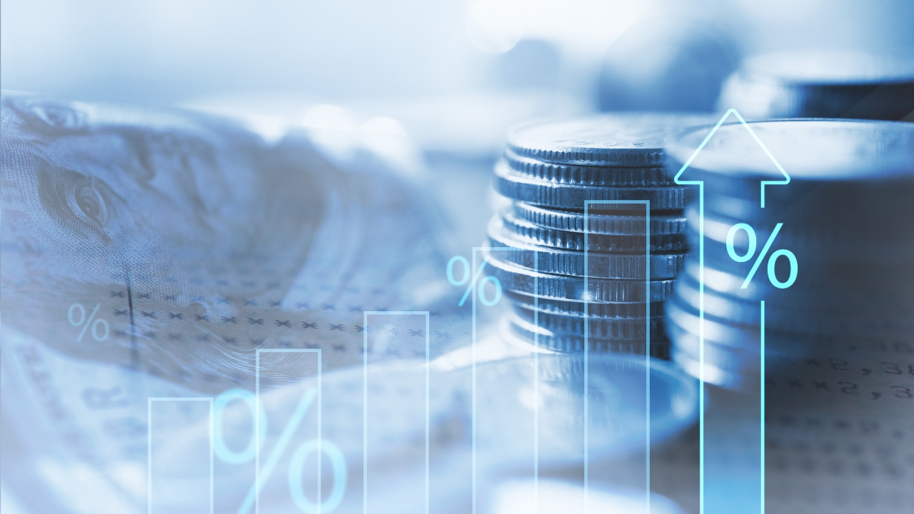 Stacks of coins and a rising percentage chart show pricing changes over time